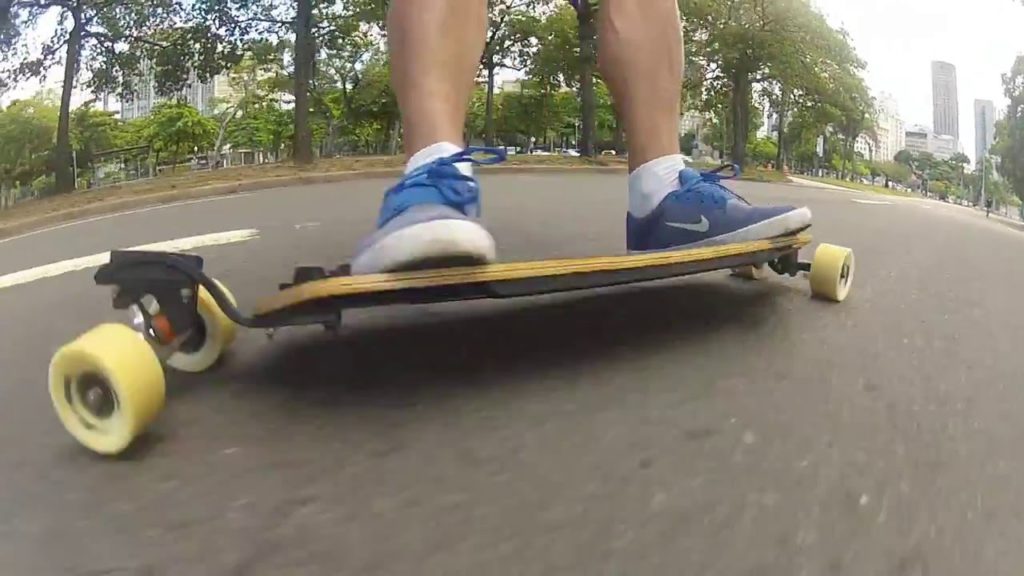 How to stop pump a longboard
